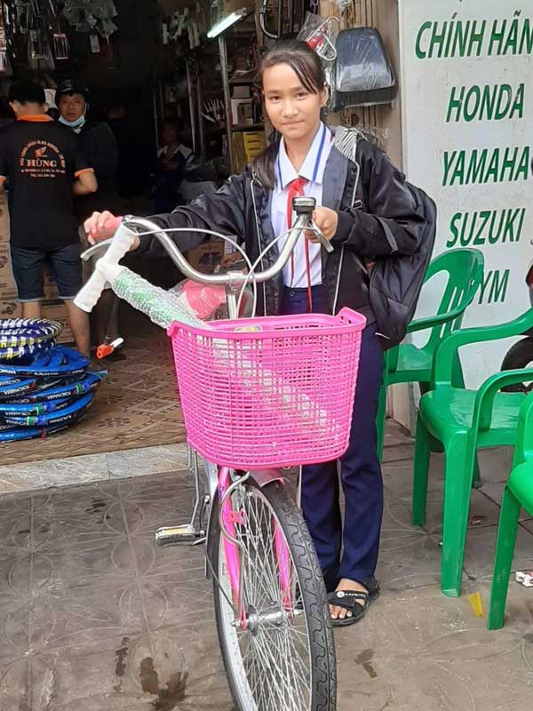 Bich with her new bicycle.