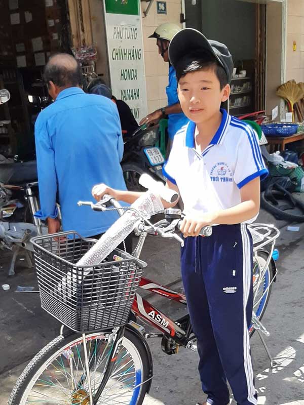 Phuc with his new bicycle.